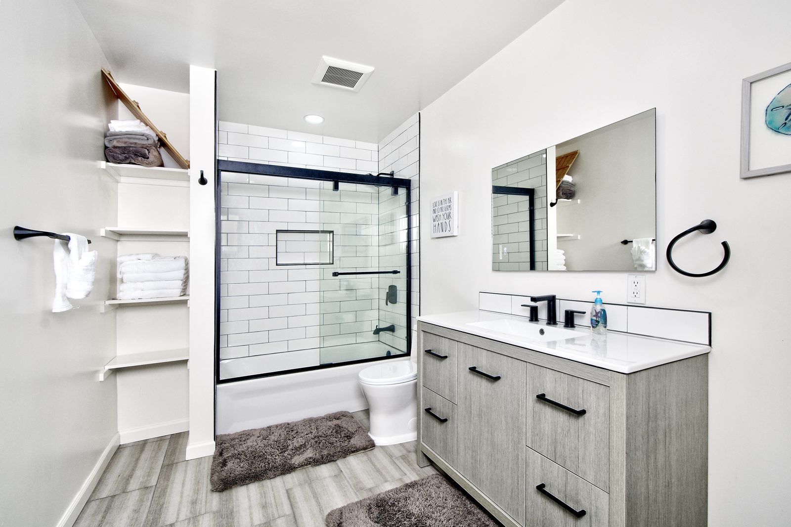Bathroom with vanity and walk-in shower