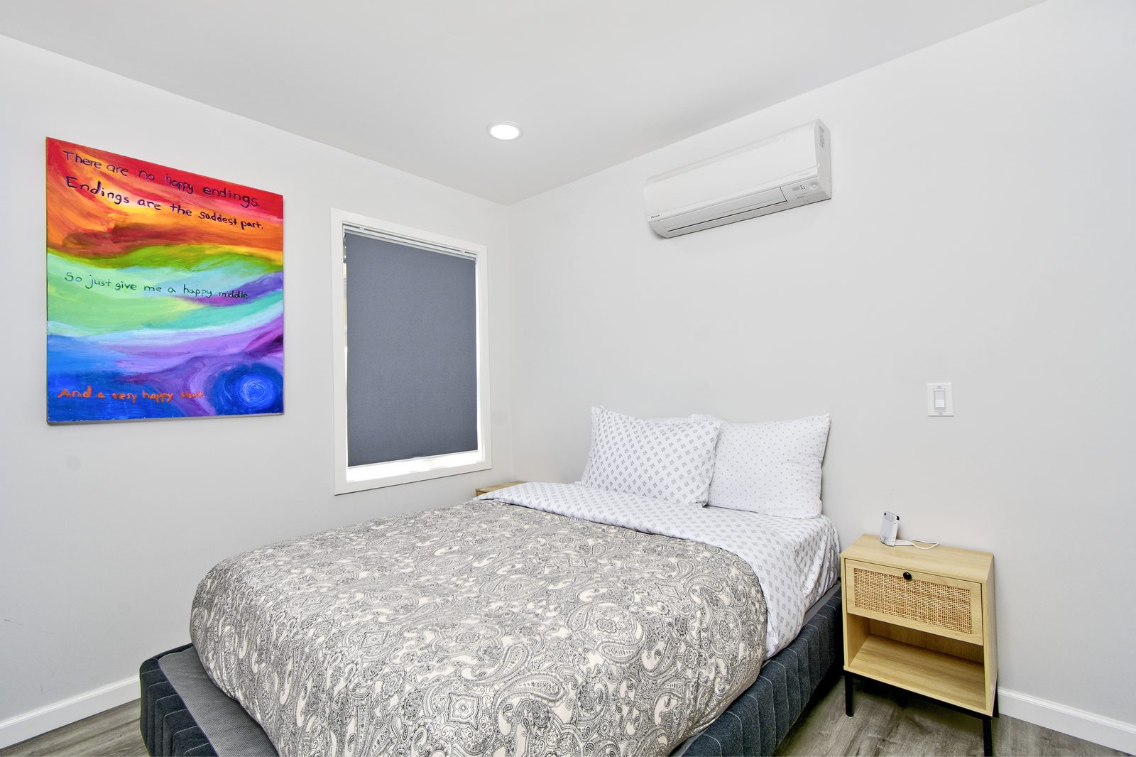 Second bedroom with a full-size bed in the 2-bedroom home